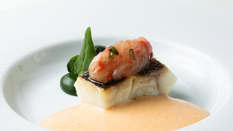 Baked sea bass with tomato confit