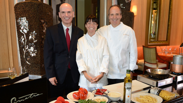 Chef Theo Schoenegger next to Frank Sinatra's granddaughter, AJ Lambert, at the Sinatra restaurant in Wynn Las Vegas