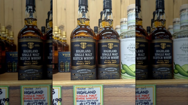 Close up of Trader Joe's Scotch whisky on the shelf, mirrored image