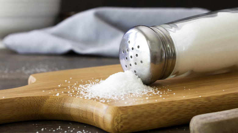 Salt spilling out of salt shaker