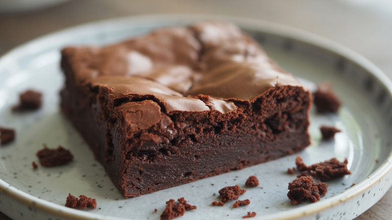 A fudgy brownie on a plate