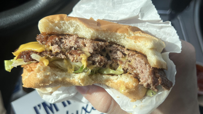 Close-up of a ButterBurger that's been bitten into.