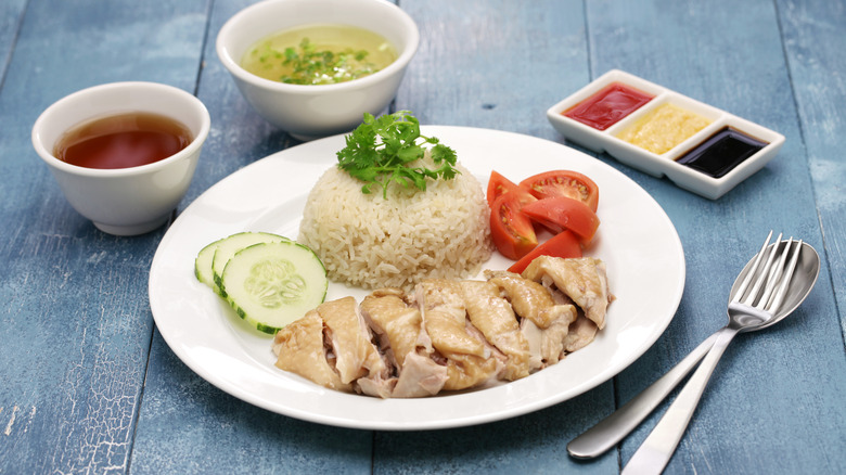 hainanese chicken rice on blue table