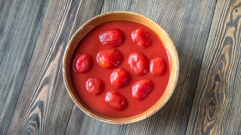 A bowl of canned San Marzano tomatoes