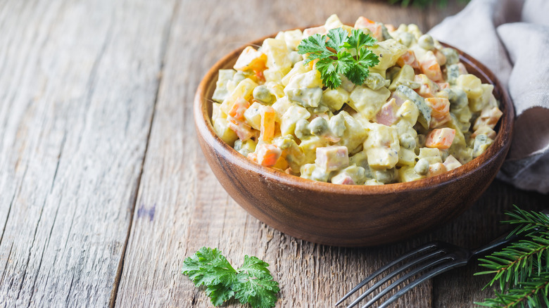 Russian potato salad served in bowl