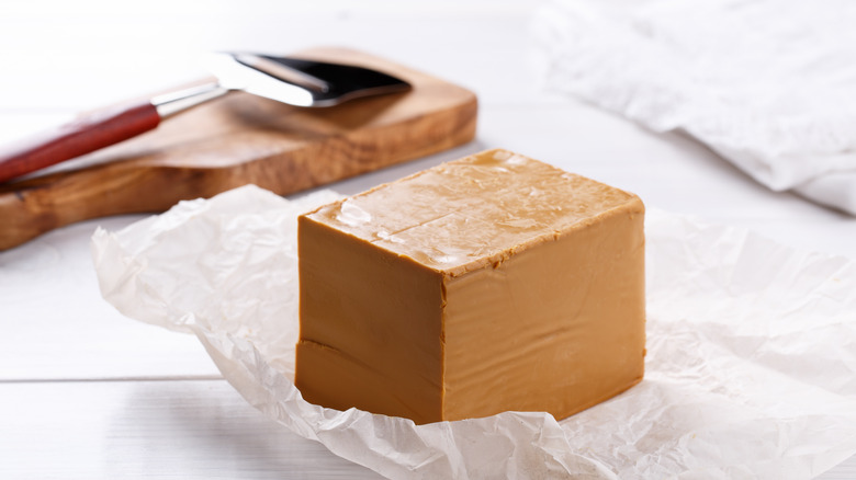 Scandinavian brown cheese displayed on table