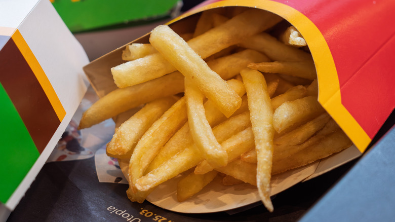 McDonald's fries in a paper carton on its side