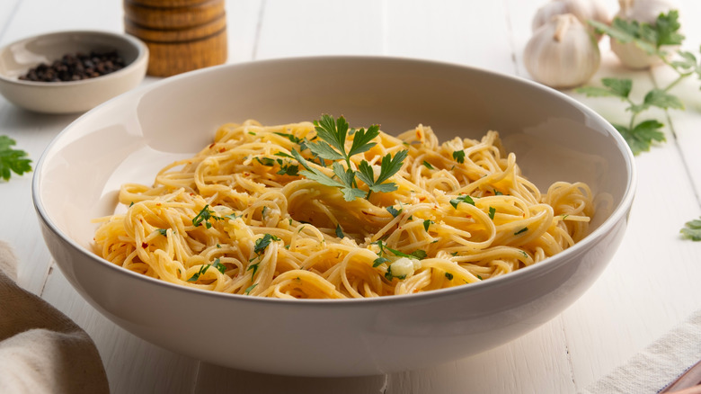 Dish of pasta olio with fresh herbs