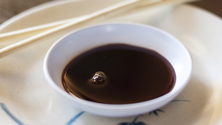 A bowl of soy sauce