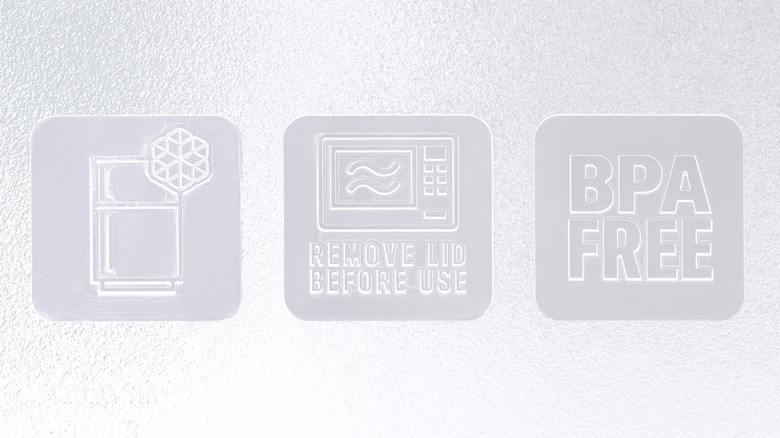 A series of symbols on a plastic container, with the microwave save wavy lines in the middle
