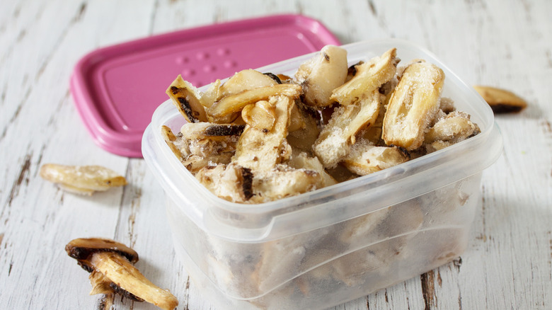 Frozen mushrooms in container