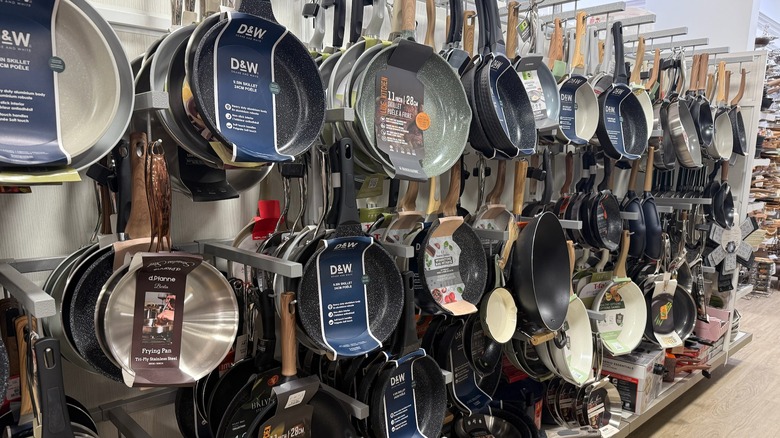 large display of skillets at HomeGoods