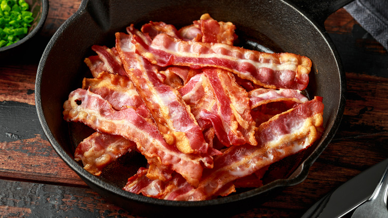 pan of cooked streaky bacon