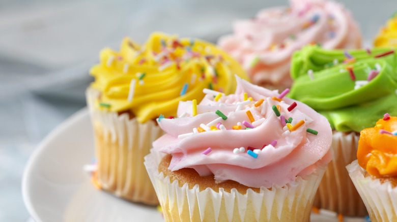 brightly colored cupcakes