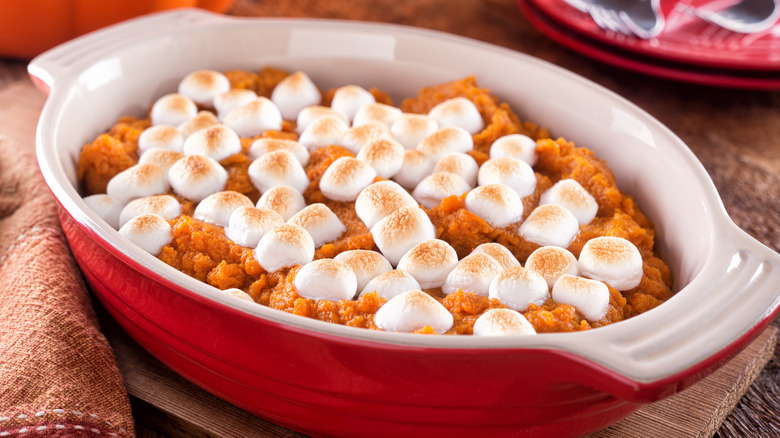 sweet potato casserole topped with marshmallows in dish