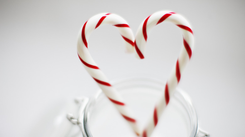 two candy canes making a heart