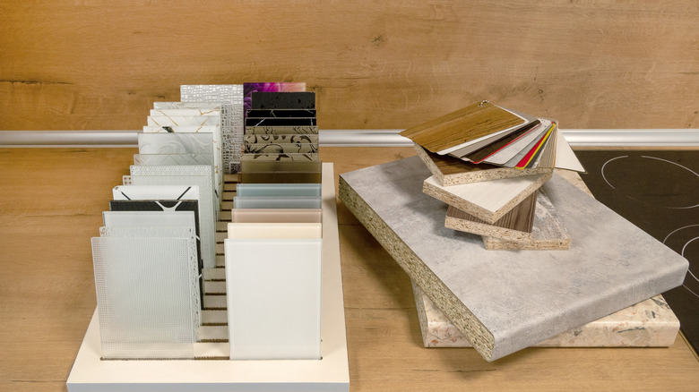 Various kitchen countertop materials on a table