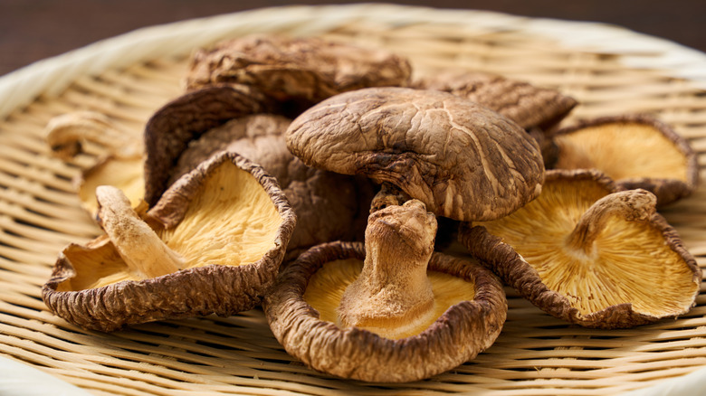 Dried shiitake mushrooms on bamboo basket