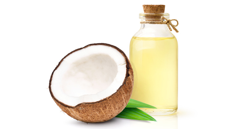 Half of a coconut and oil