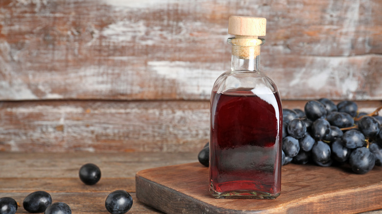 Red wine vinegar bottled, with grapes