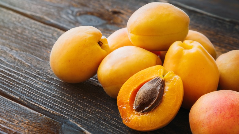 Pile of apricots on table