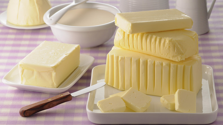 plates of butter on table