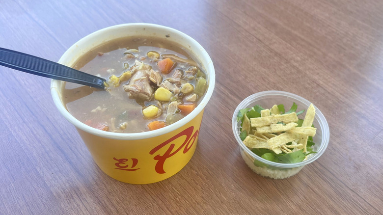Bowl of chicken soup on a table