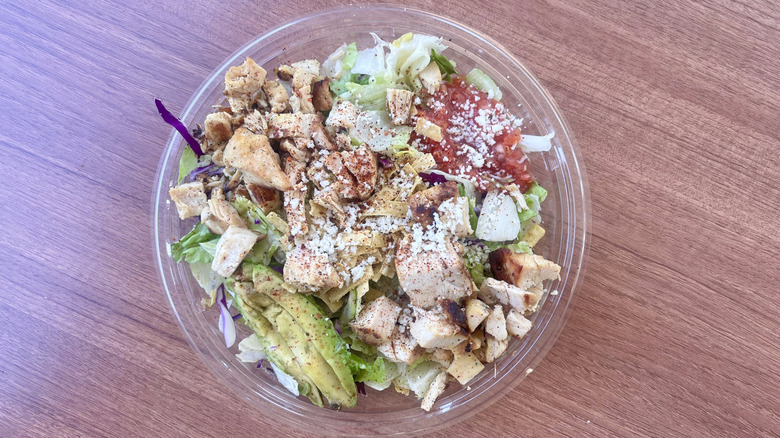 Chicken salad Caesar on a table