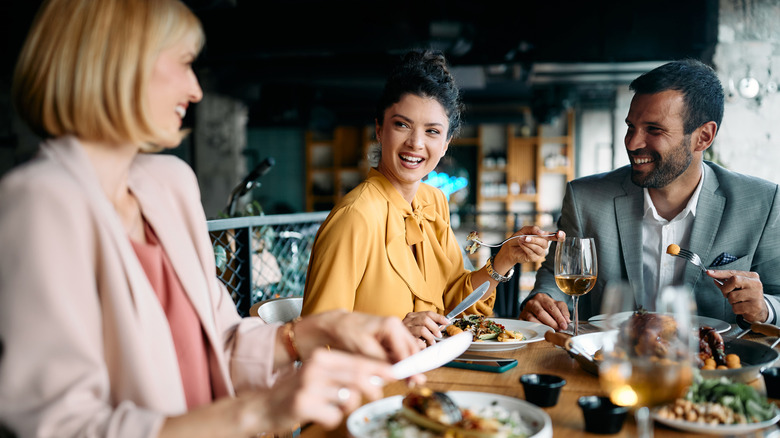 business people sharing a meal
