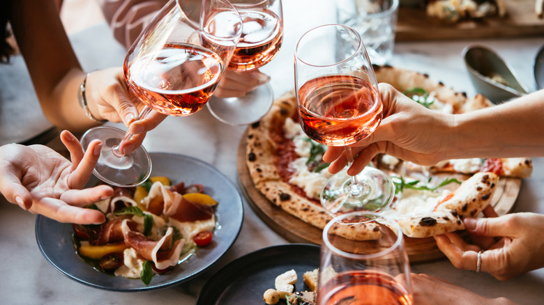 Plates of Italian food with wine