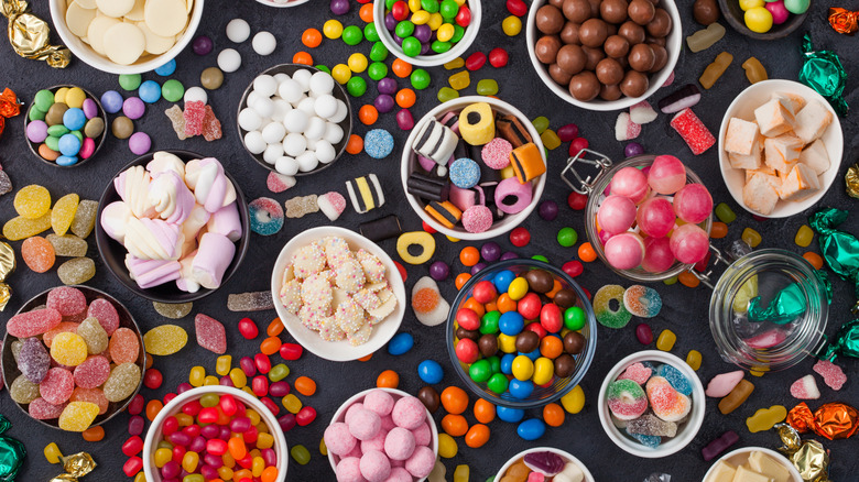 assorted candy in bowls