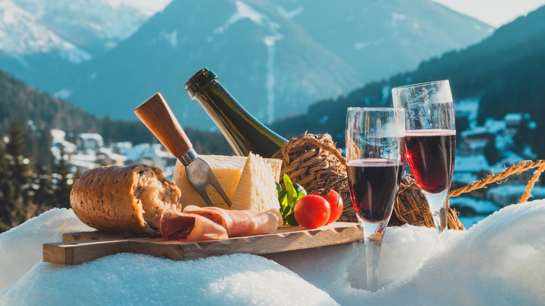 food and wine in snow