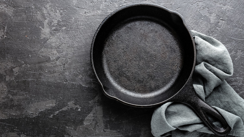 cast-iron skillet on grey table