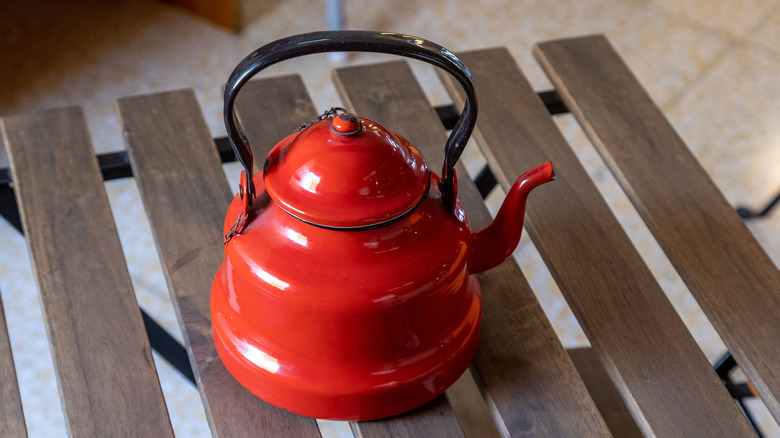 red ceramic kettle
