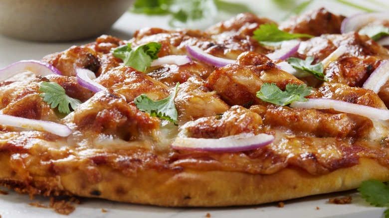 flatbread pizza with red onion and cilantro