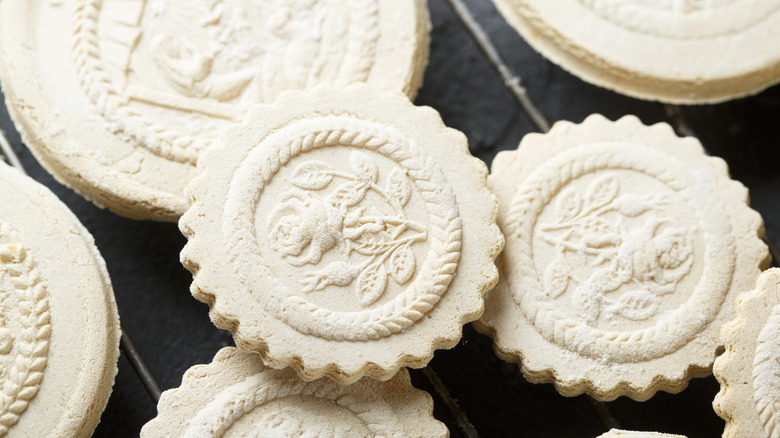 Close up image of baked German springerle cookies decorated with a floral print