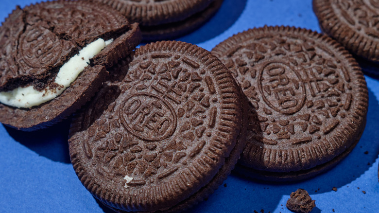 Pile of Oreos on blue background
