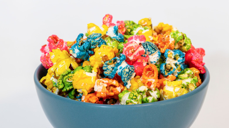 Bowl of popcorn in shades red, orange, yellow, blue and green