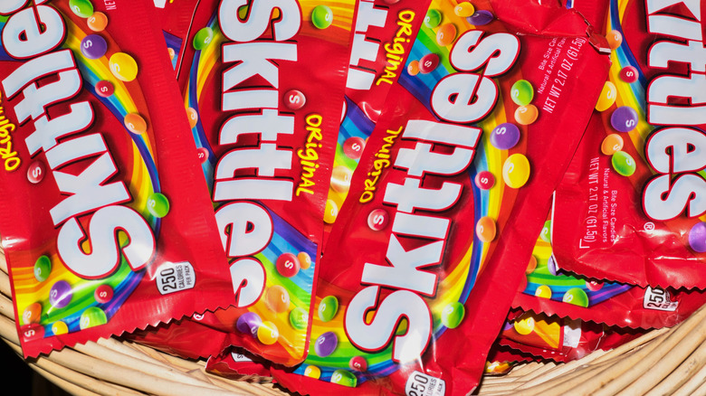 Skittles bags in a basket