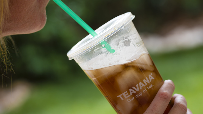person drinking starbucks cold brew