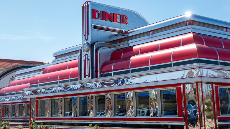 Shiny old-school diner exterior on sunny day