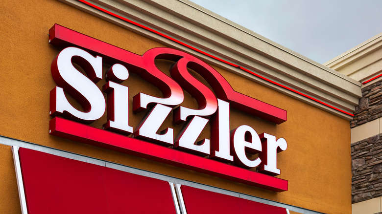 close up of Sizzler restaurant sign