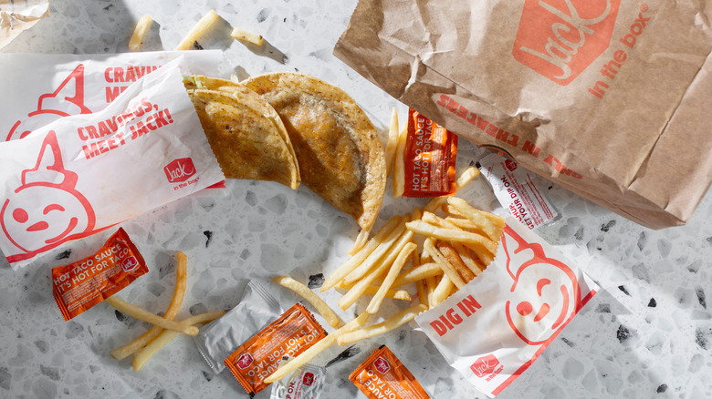 A top down view of a spread of Jack in the Box menu items