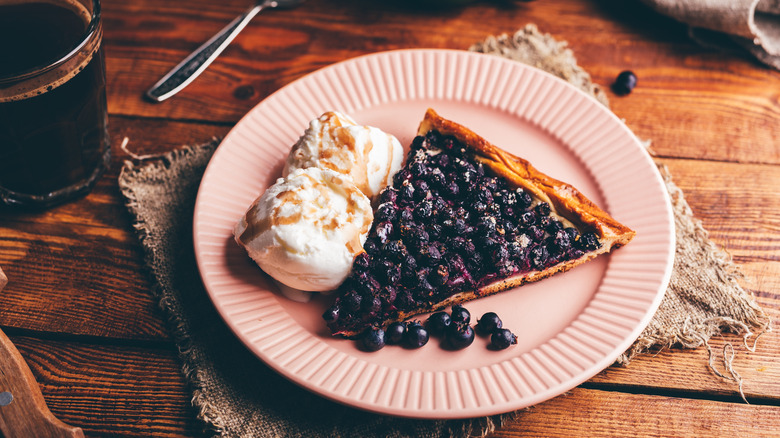 ice cream served with berry pie