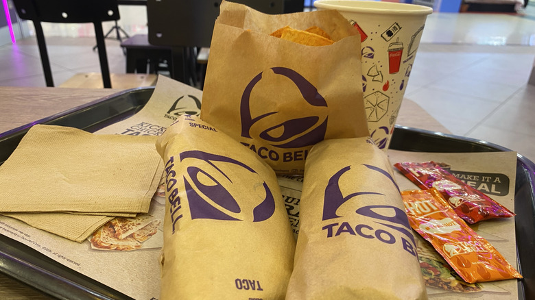 Array of Taco Bell items wrapped in branded paper
