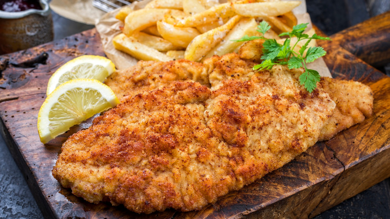 schnitzel with fries and lemon