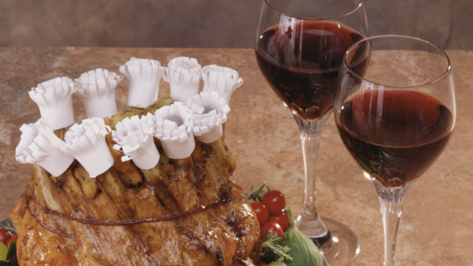 What's The Purpose Of Those White Paper 'Hats' On A Crown Roast? - Tasting Table