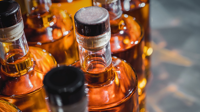 bottled amber colored liquor