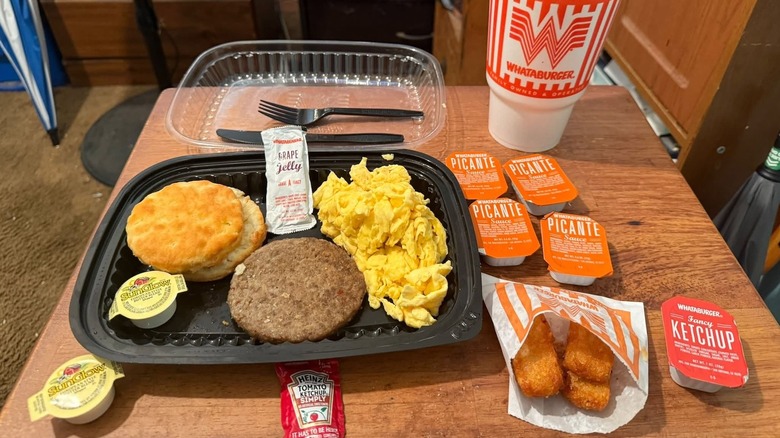A breakfast platter of eggs, biscuits, and sausage from Whataburger