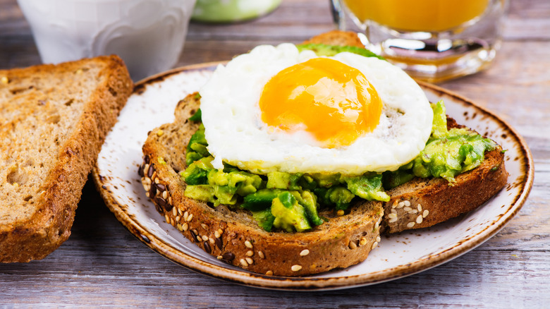 Avocado toast with a fried egg on top